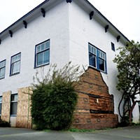 Improvements have been made to the 833 H St. apartment complex owned by Floyd Squires, pictured here after earthquake damage in early 2010, but broken windows and other repairs remain to be done at the building that was the subject of a succesful nuissance lawsuit brought by neighbors.