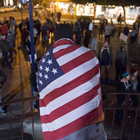 A pro-Trump counter protester at the Old Town gazebo on Thursday evening.