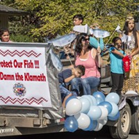 Participants representing the Yurok Tribe Social Services Department advocated for salmon and dam removal and tossed candy to the crowd from their parade float at the 2016 Klamath Salmon Festival.