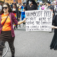 Protesters carried signs in the 2016 Humboldt Pride march.