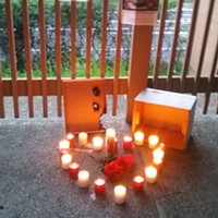 Candles lit in honor of David Josiah Lawson