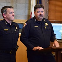 Former Arcata Police Chief Tom Chapman, right, at a press conference with University Police Chief Donn Peterson last year.