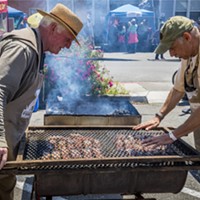 Staffing the barbecue racks filled with coho salmon kept Bruce Wayne (left) and Tim Needham busy.