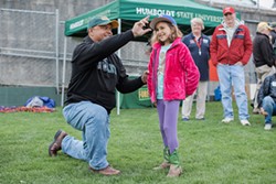 PHOTO BY LE&Oacute;N VILLAG&Oacute;MEZ - HSU President Tom Jackson Jr. capped his first day on the job with a trip to the Arcata Ball Park, where he watched the Humboldt Crabs beat the California Expos.
