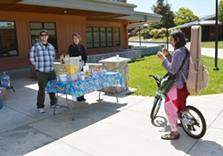 CR students enjoying refreshments in front of the resource center.