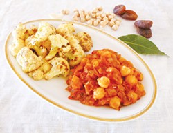 PHOTO BY SIMONA CARINI - A recipe from another hemisphere: Chickpeas with tomatoes and dried apricots, with a side of cauliflower.