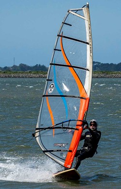 PHOTO BY MARK LARSON - Peter Portugal showed some strong windsurfing skills in the strong winds on Humboldt Bay.