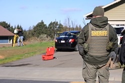 HUMBOLDT COUNTY SHERIFF'S OFFICE - Investigators process the scene of what's believed to be Humboldt County's first triple homicide in decades the morning of Feb. 10.