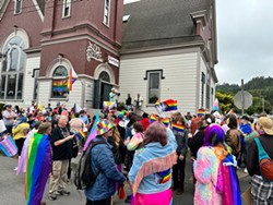 PHOTO BY JENNIFER CAHILL - Lost Coast Pride founder Kaelan Rivera addresses the crowd from the steps of the Old Steeple before the march begins.