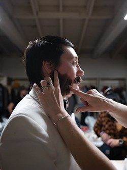 PHOTO BY DAVE WOODY - Jaye Templeton gets a set of mutton chops in the makeup room.