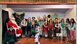 Girl Scouts sang carols for Santa
