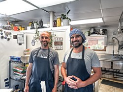 PHOTO BY JENNIFER FUMIKO CAHILL - Manager Tony Dontchev and Falafelove owner Avi Leibson in the kitchen.