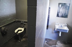 GRANT SCOTT-GOFORTH. - The interior of one of Old Town Eureka's much-abused public toilets.