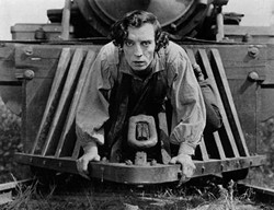 BY BUSTER KEATON - HTTP://WWW.ARCHIVE.ORG/DETAILS/THE_GENERAL_BUSTER_KEATON, PUBLIC DOMAIN, HTTPS://COMMONS.WIKIMEDIA.ORG/W/INDEX.PHP?CURID=17570271 - Buster Keaton rides the cowcatcher in The General