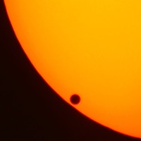 Venus just after "second contact," beginning its June 8, 2004 transit across the face of the sun.
