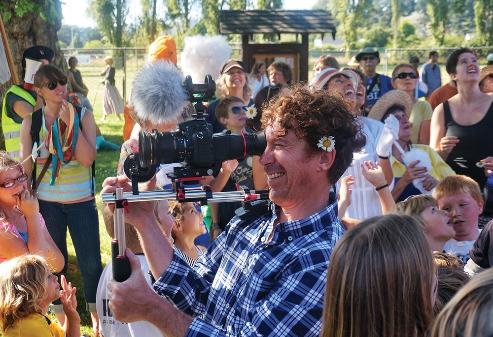 Videographer Chuck Johnson shoots a music video for new band Mad River Rose on Sunday, June 29, in Blue Lake's Perigot Park. - PHOTO BY BOB DORAN