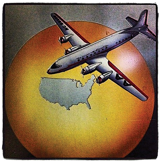 Vintage advertising art for American Airlines at the Silver Lining Restaurant. - PHOTO BY BOB DORAN
